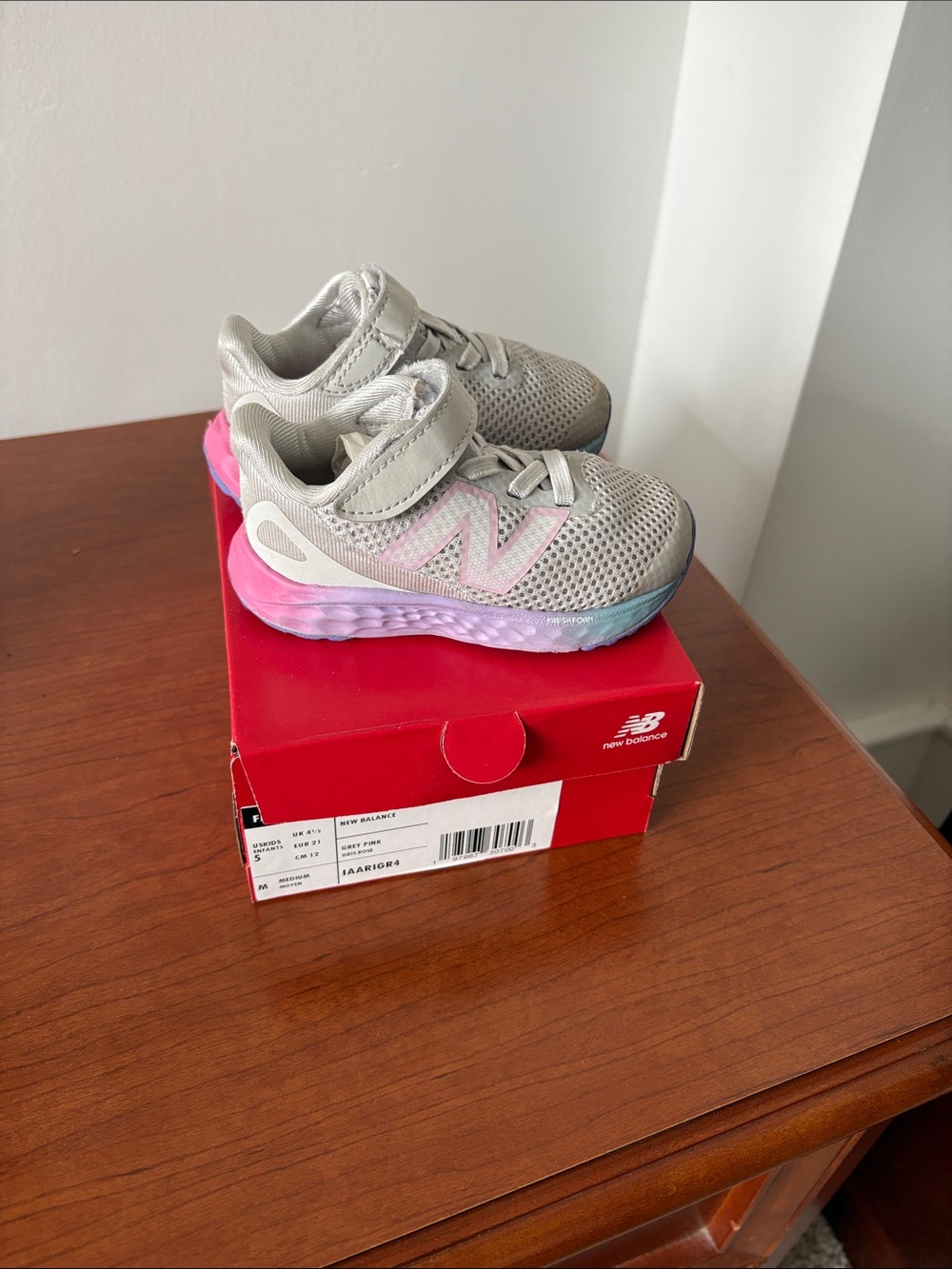 New Balance Kids Gray Sneakers with Pink and Blue Gradient Sole